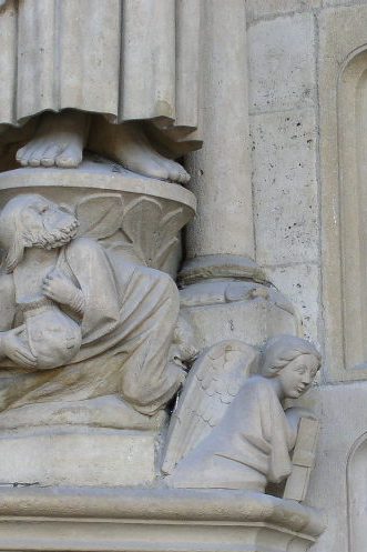 Notre-Dame de Paris grand portail évangélistes tétramorphe Ange homme